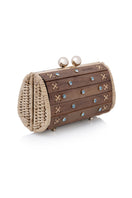 Waiwai Rio Petit Baoba clutch bag in Oud Safira with textured blue finish and compact design for elegant occasions.