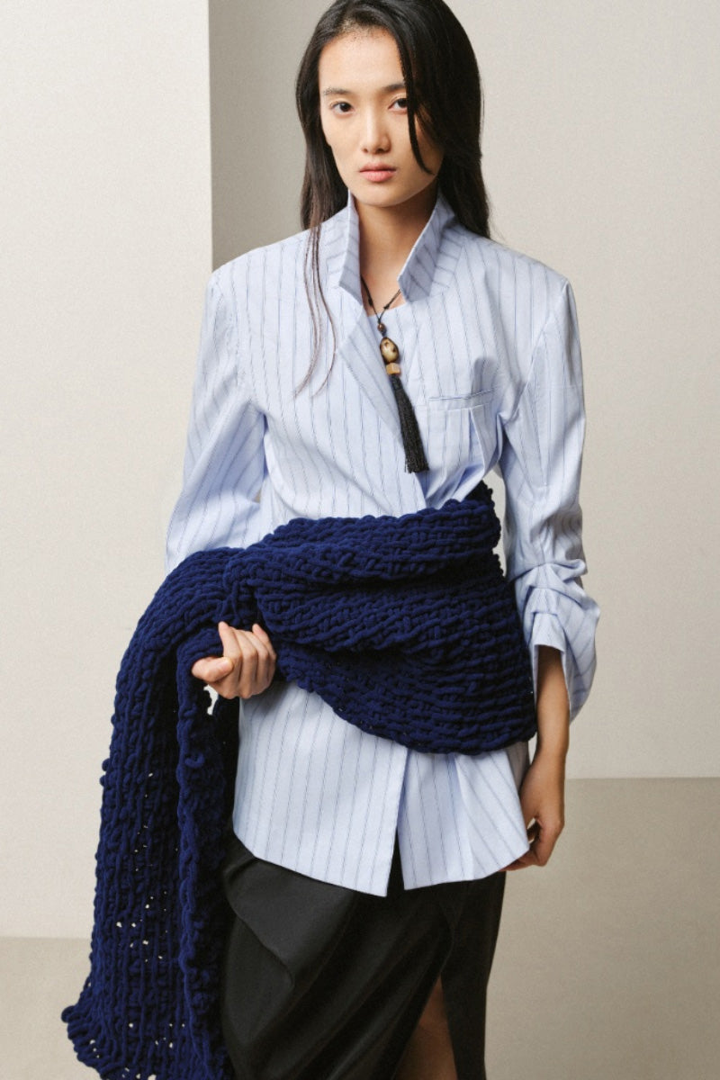 Light blue pinstripe gathered-cuff shirt by Leicia, featuring a classic collar and button-front design, laid flat for display.