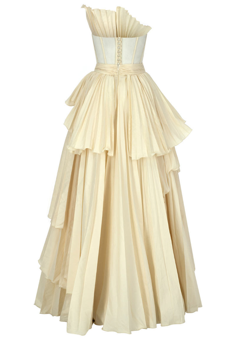 Elegant Claire vanilla tiered gown by Tarık Ediz featuring flowing fabric and layered design, perfect for formal occasions.