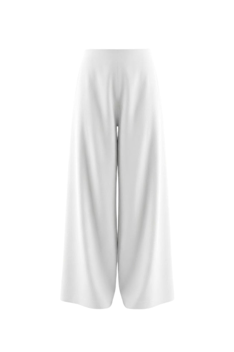White diagonal pants by Keira Tong, featuring a stylish pattern and tapered fit, shown on a model.