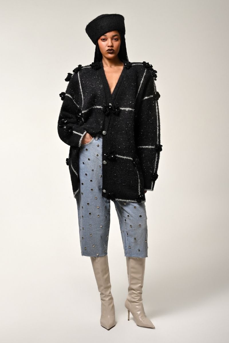 Lalo oversized cardigan with black and silver floral pattern, cozy knit with long sleeves and relaxed fit.