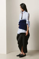 Lecia ruched slit midi skirt in soft fabric, featuring a high slit and fitted waist, perfect for stylish, elegant outfits.
