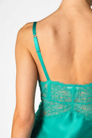 NK Imode Morgan Cradle Bust silk chemise in turquoise, featuring delicate straps and smooth, luxurious fabric.