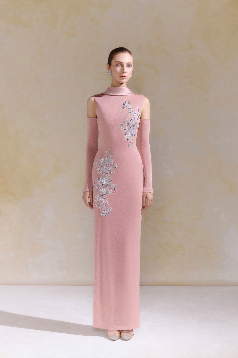 Arti Apparel Dahlia midi dress featuring a flowy fabric and floral pattern, displayed on a hanger against a neutral background.