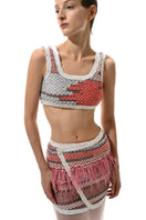 Lalo Avril crop top in vibrant red multi with a stylish design, shown on a model, perfect for casual and trendy outfits.