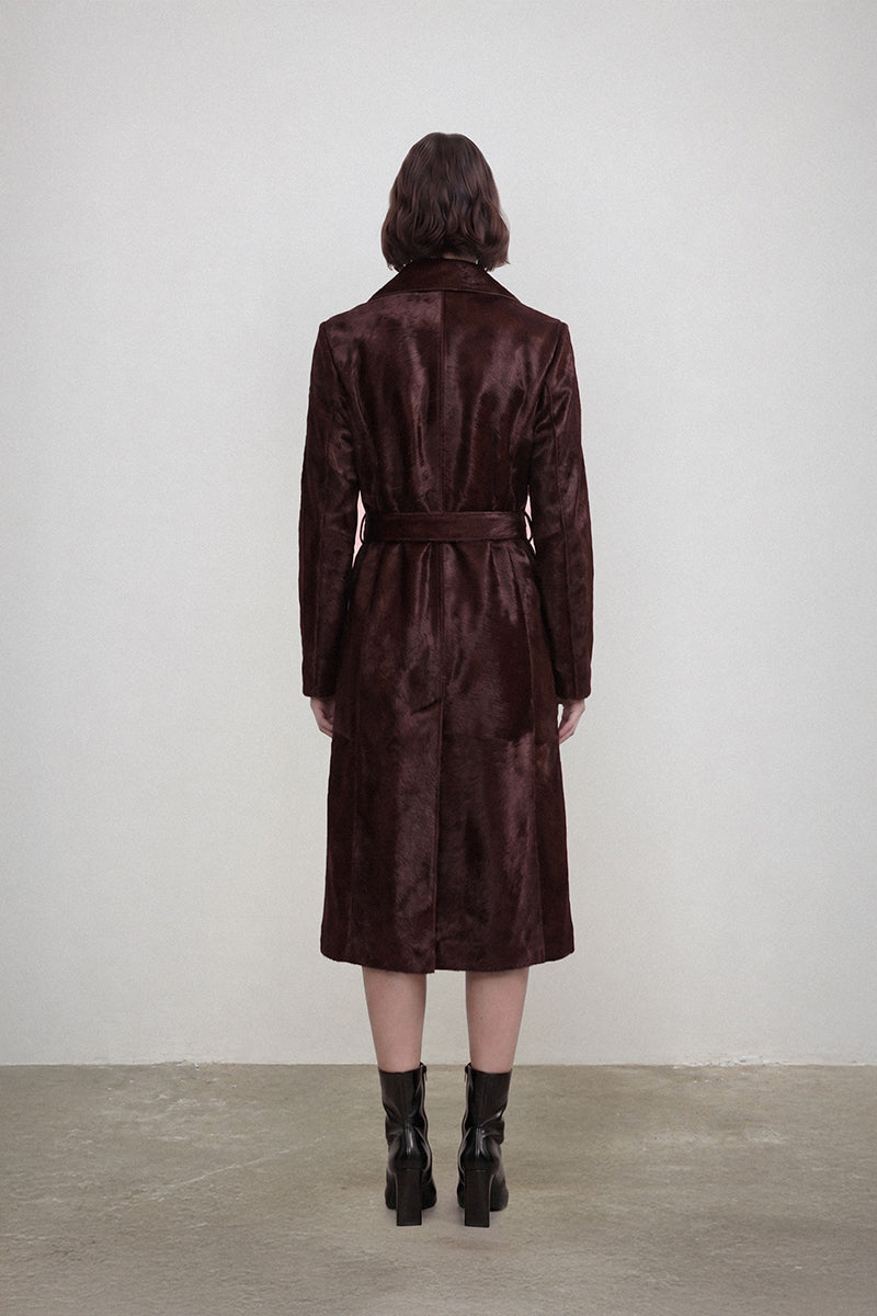 Deme By Gabriella brown leather cherry jacket with a classic collar and front button closure, stylishly displayed on a hanger.