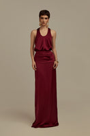Elegant burgundy Hesperus gown by POEM, featuring flowing fabric and sophisticated design, perfect for formal occasions.