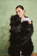 White Plan Midnight Faux Fur Coat featuring a plush, luxurious dark fur exterior and stylish collar for a cozy winter look.