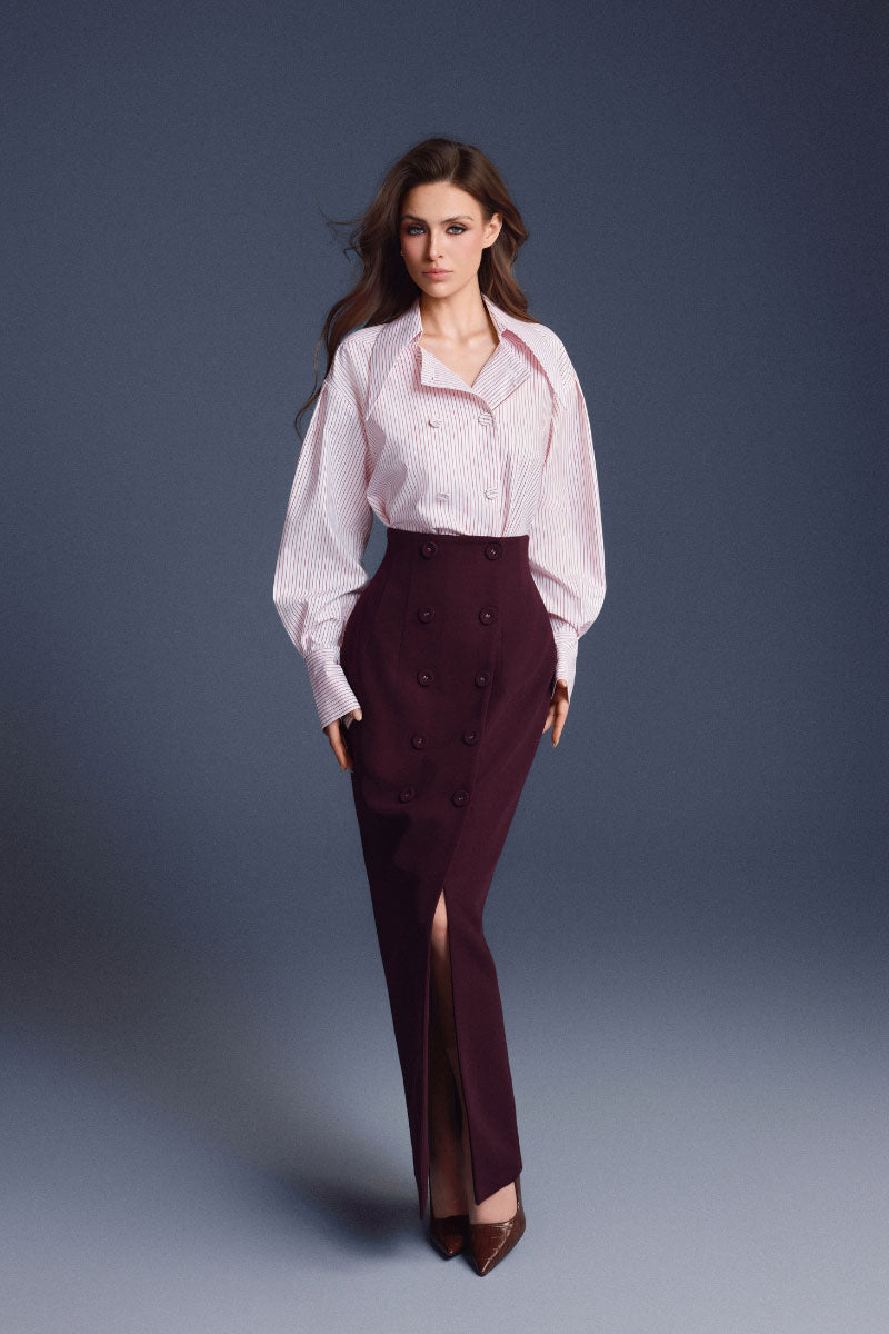 Keira Tong sculpted maxi skirt with button details, featuring a flowing silhouette and elegant design.