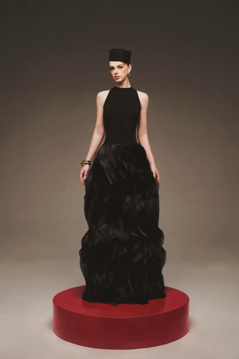 Elegant midnight blue organza maxi gown from Margée Atelier with flowing fabric and intricate detailing.