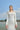 WHITE LONG SLEEVE TRAPEZOID NECKLINE BODYCON FULL DRESS | Tracy Studio | CULT MIA