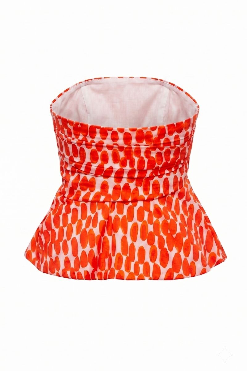 Sisters Fiora Ruby Rush top featuring a vibrant red color and stylish design, displayed on a hanger against a neutral background.