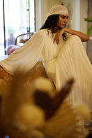 Deme By Gabriella Luna Maxi Dress in flowy fabric with a fitted waist and sleeveless design, perfect for summer occasions.
