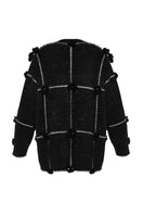 Lalo oversized cardigan with black and silver floral pattern, featuring a cozy, relaxed fit and stylish design.