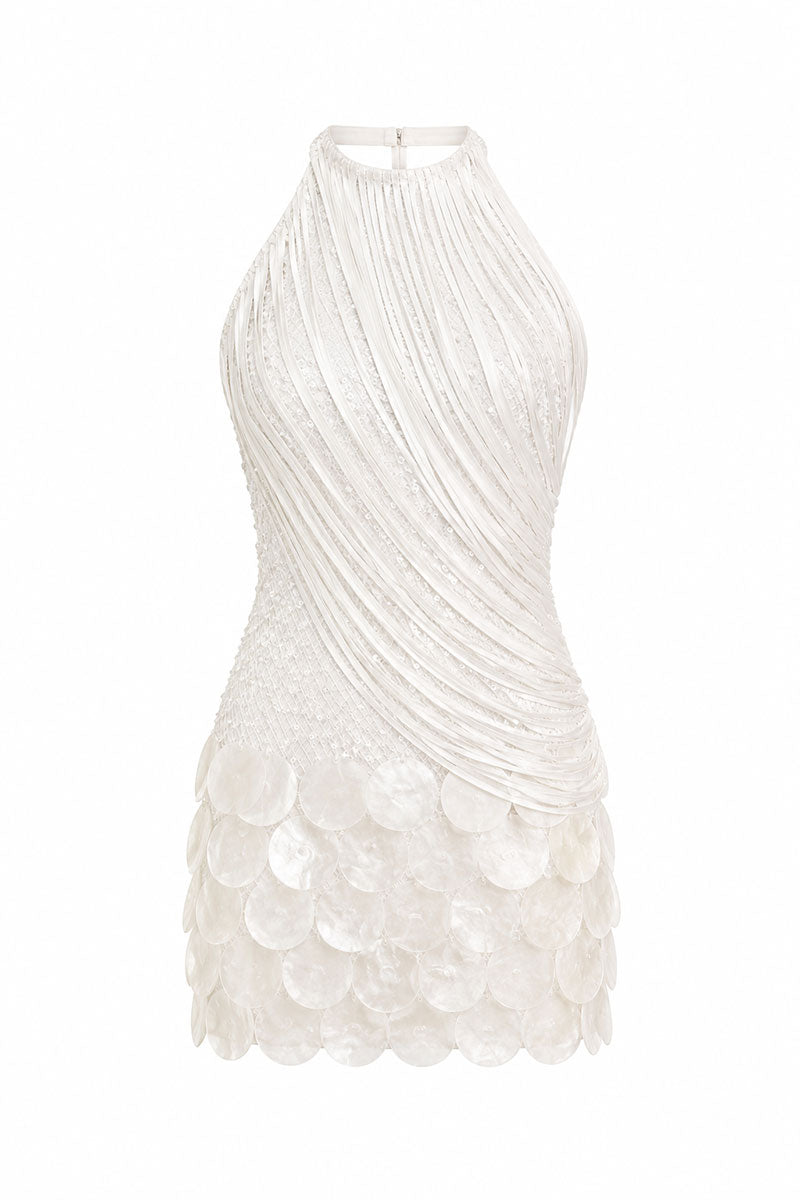 Francisco Arce TAIA mini dress with vibrant floral pattern, sleeveless design, and fitted silhouette on a model.