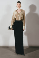 Black long pencil skirt by Lecia, featuring a sleek maxi skirt design with a fitted silhouette and smooth fabric.