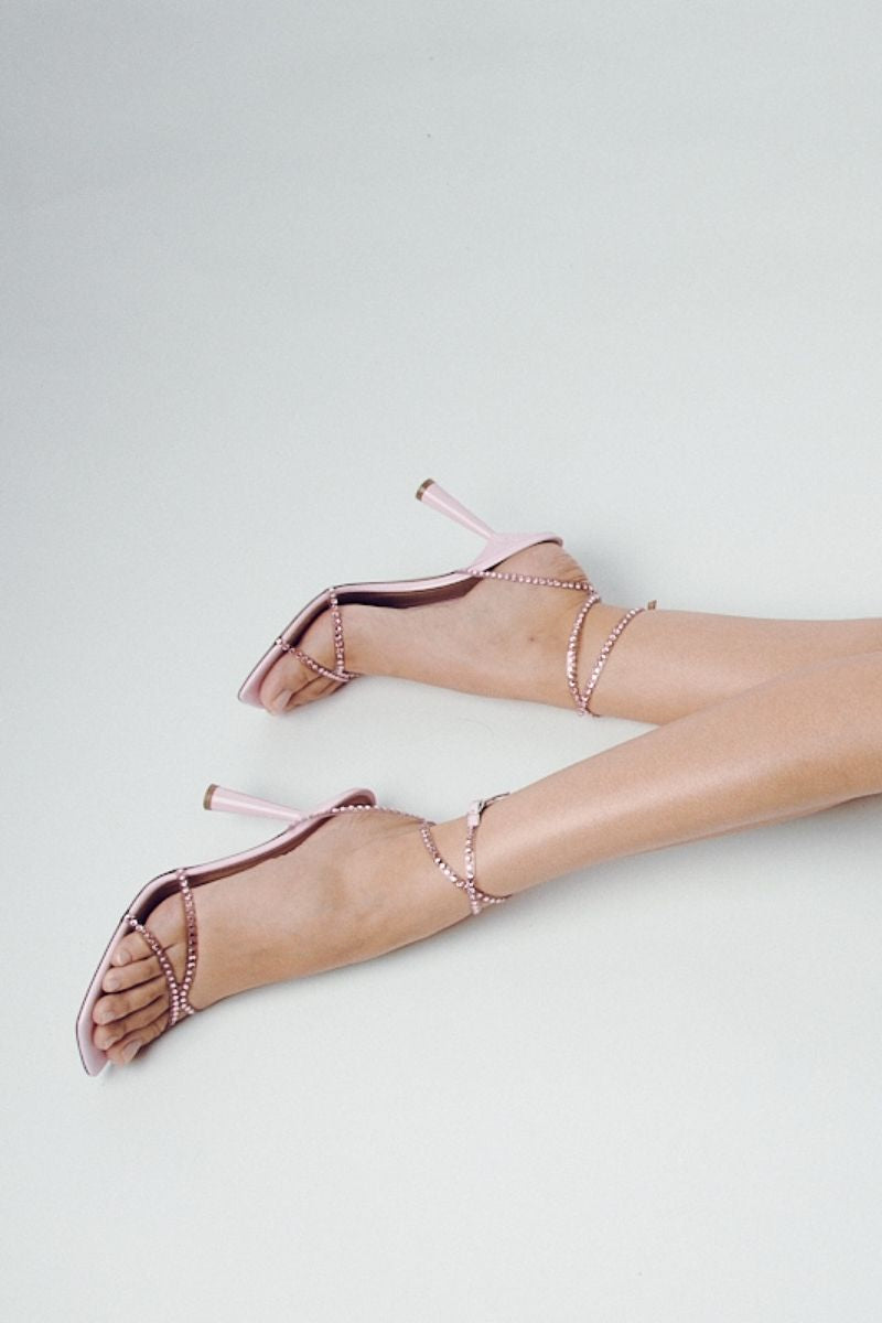 Kolane Kim sandal in rose pink with crystal embellishments and transparent straps, stylish open-toe footwear for women.