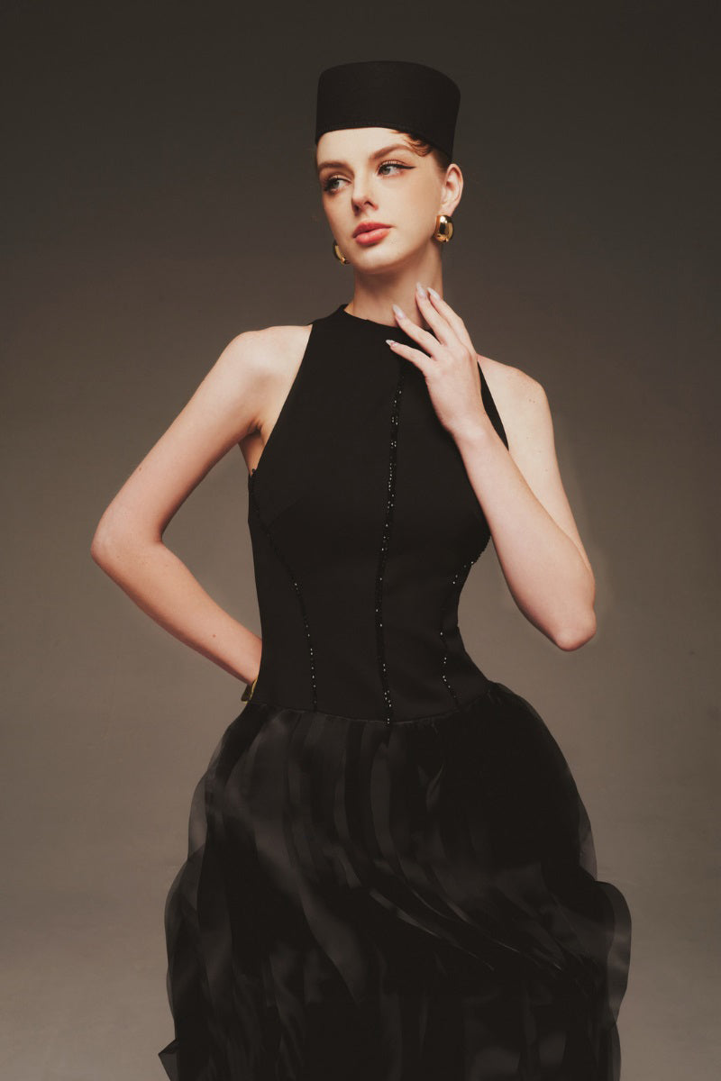 Elegant midnight blue organza gown by Margée Atelier, flowing maxi dress with delicate fabric and sophisticated design.