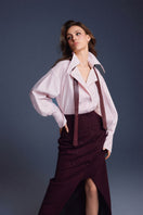 Keira Tong Buttoned Sculpted Maxi Skirt in soft fabric, featuring a fitted silhouette and stylish button details.
