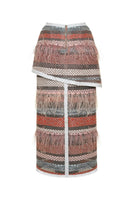 Lalo Avril maxi skirt in red multi with flowing fabric and vibrant pattern, styled for a casual or dressy look.