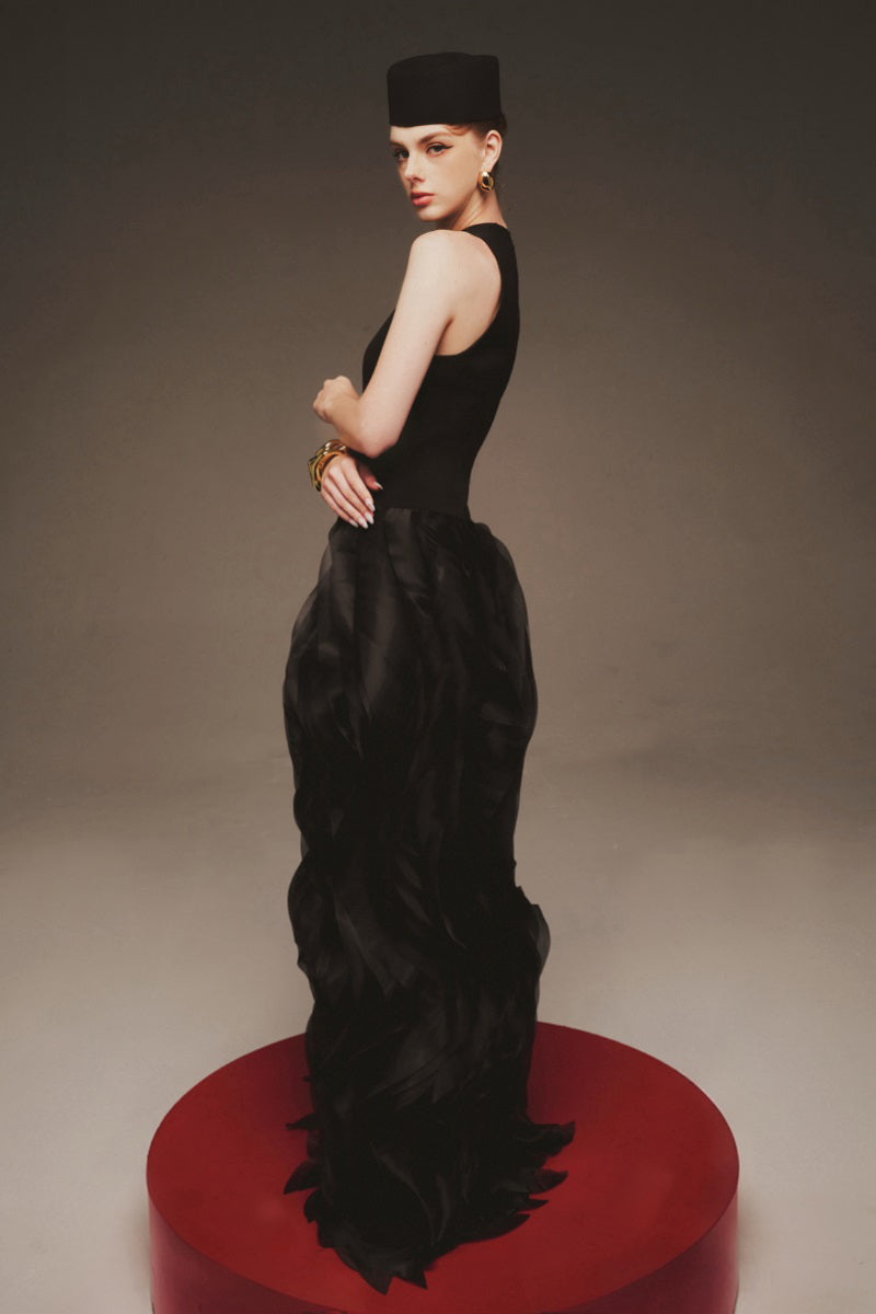 Elegant midnight blue organza gown from Margée Atelier, showcasing flowing maxi dress with intricate details and a graceful silhouette.