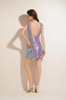 Purple Valenciani mini dress with sequins and keyhole cutout, stylish and fitted for evening wear.
