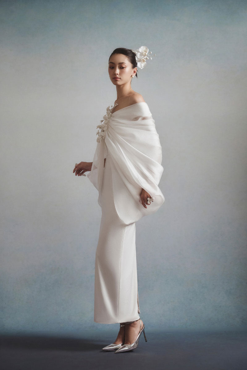 White Plan ELYSIA draped midi dress with soft fabric and elegant design, shown on a model against a neutral background.