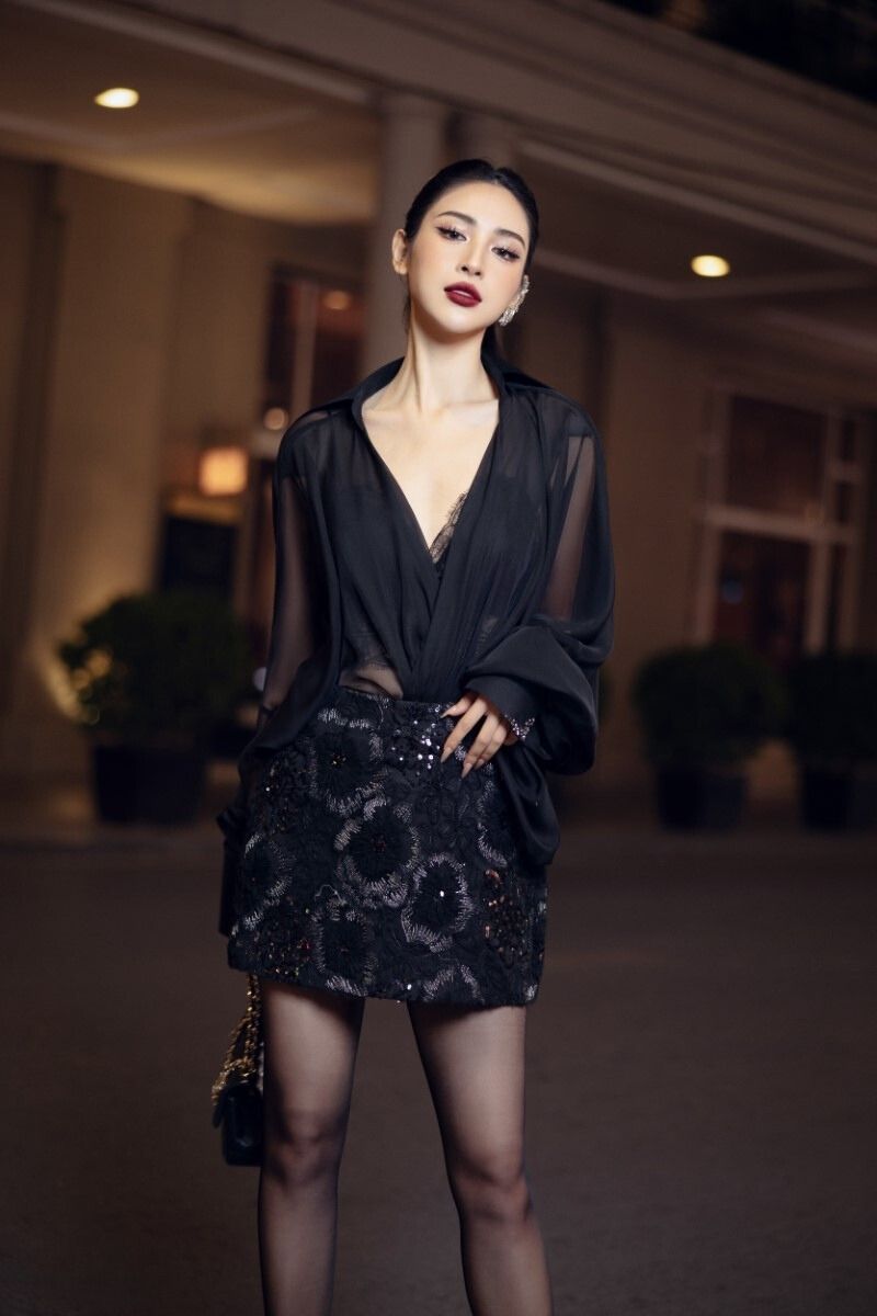 Black silk pleated co-ords set by 21Six featuring a stylish top and matching skirt with elegant pleats.
