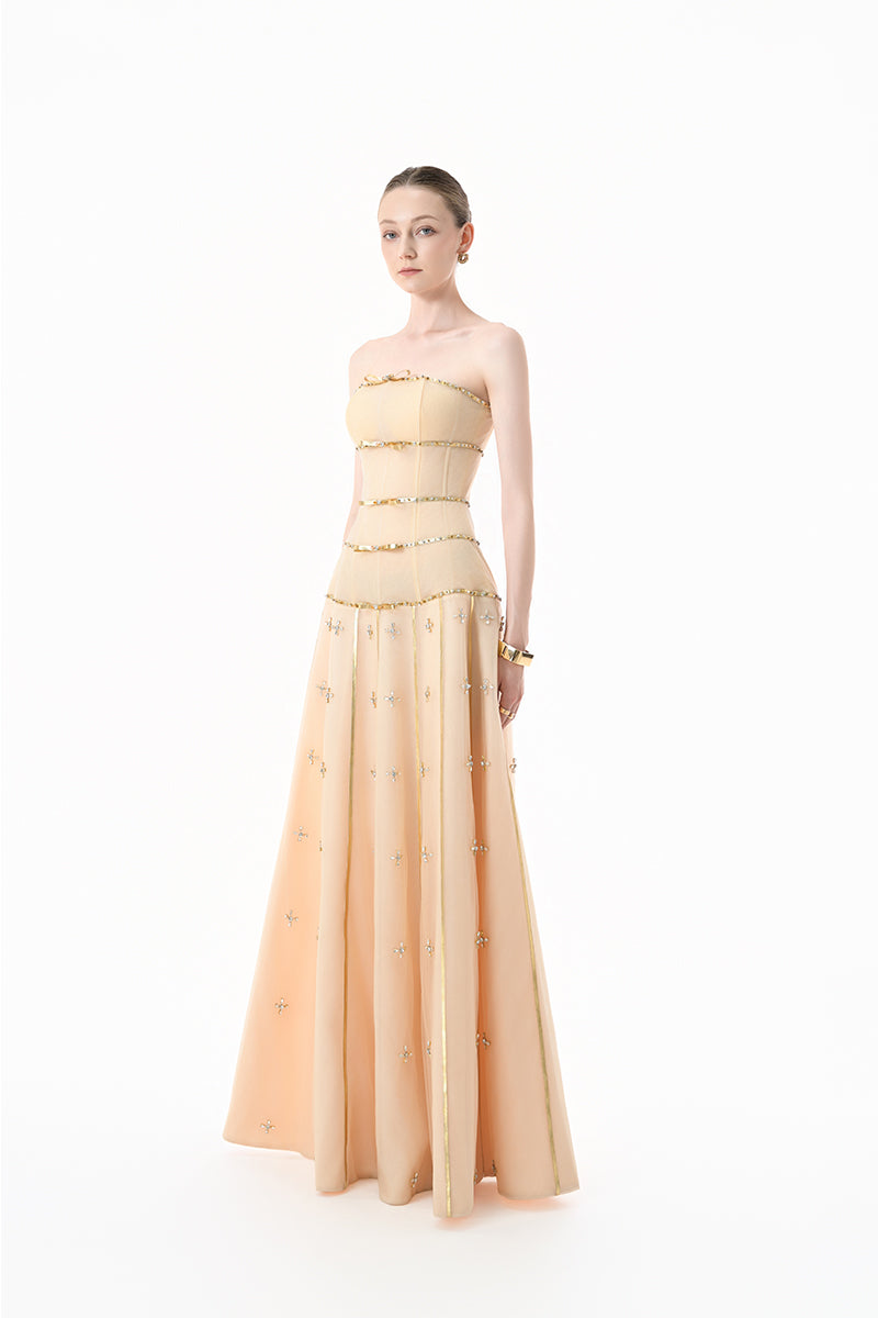 Elegant nude gold-banded embellished A-line gown by Happy Clothing, featuring intricate details and a flowing silhouette.