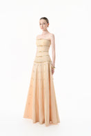 Elegant nude gold-banded embellished A-line gown by Happy Clothing, featuring intricate details and a flowing silhouette.