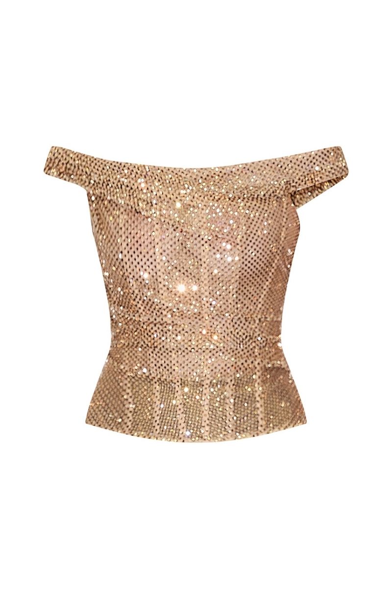 Gold hand-embellished CEM top featuring intricate embroidery and stylish design, displayed on a hanger against a neutral background.