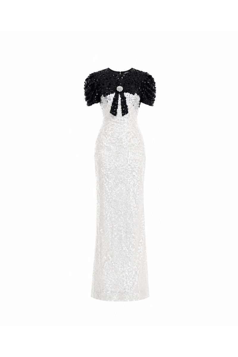 Elegant ivory maxi dress by HACCHIC COUTURE featuring contrast sequin detailing and flowing fabric for formal occasions.