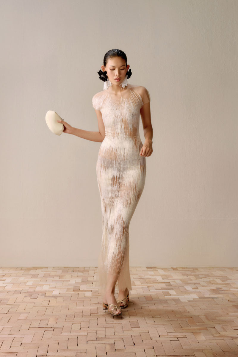 Lecia Artisanale Ember in White midi dress featuring a flowing fabric and elegant design, perfect for stylish occasions.