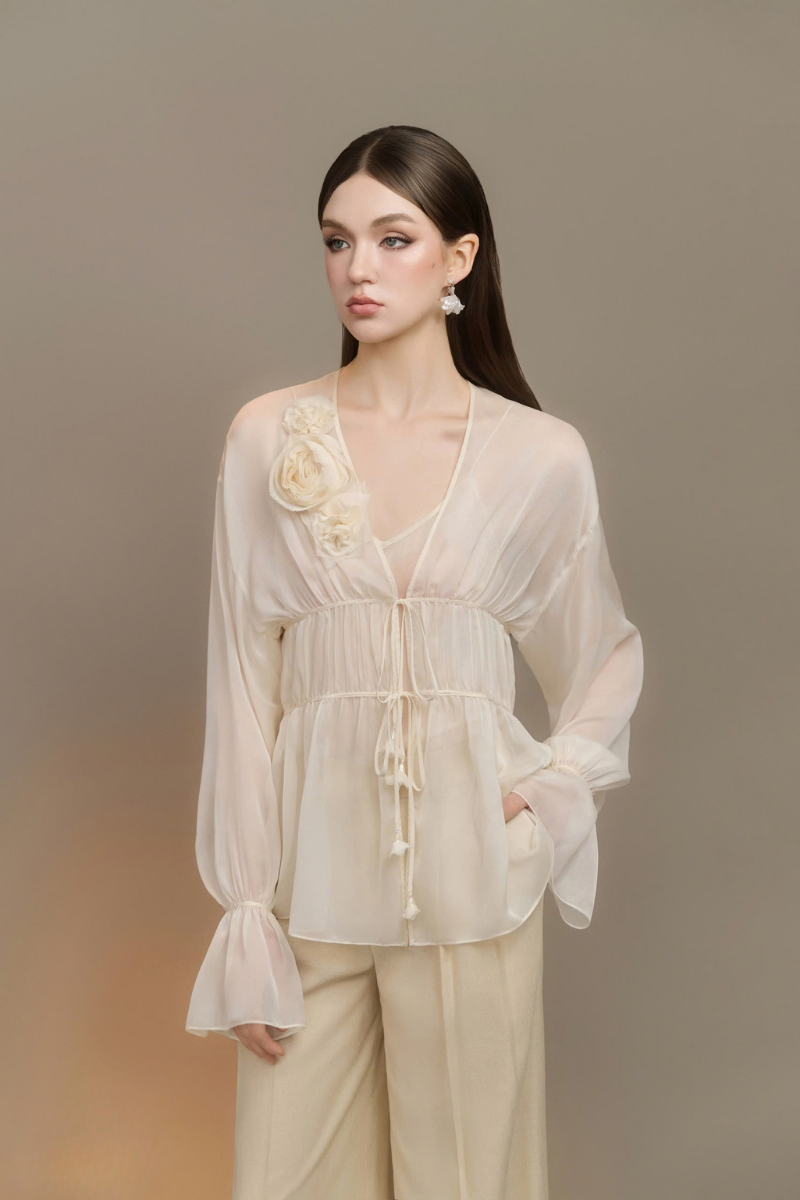 Arti Apparel Serin Top, stylish women's sleeveless blouse with a flowy design and elegant neckline.