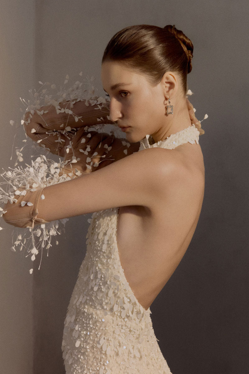 Elegant white chiffon gown by White Plan, flowing and lightweight with a graceful design, perfect for formal occasions.