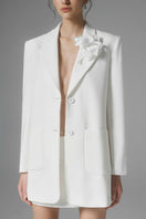 White Ontario blazer by Arti Apparel, tailored fit with lapel collar and button closure, shown on a mannequin.