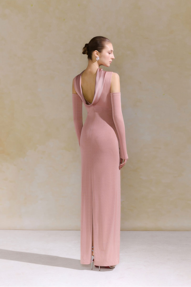 Arti Apparel Dahlia midi dress featuring a floral pattern, flowy fabric, and a fitted waist on a model.