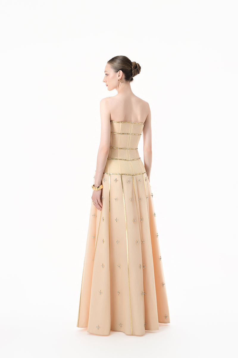 Elegant nude gold-banded embellished A-line gown by Happy Clothing, featuring intricate details and flowy fabric.