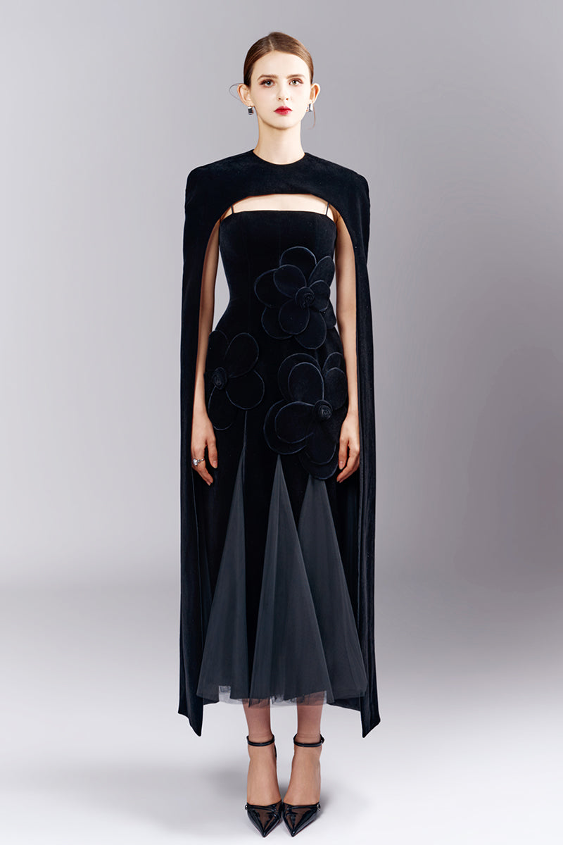 HAPPY CLOTHING CULT MIA X PRESTON Cape Tweed Petal Gown with floral details and elegant design, worn by a model.