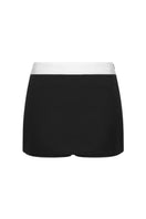 LEKIEU Yorkshire black mini skirt, fitted with a high waist and sleek design, displayed on a mannequin.