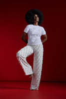 Onalaja TENE beaded white pants with intricate beadwork, stylish and comfortable for casual or dressy occasions.