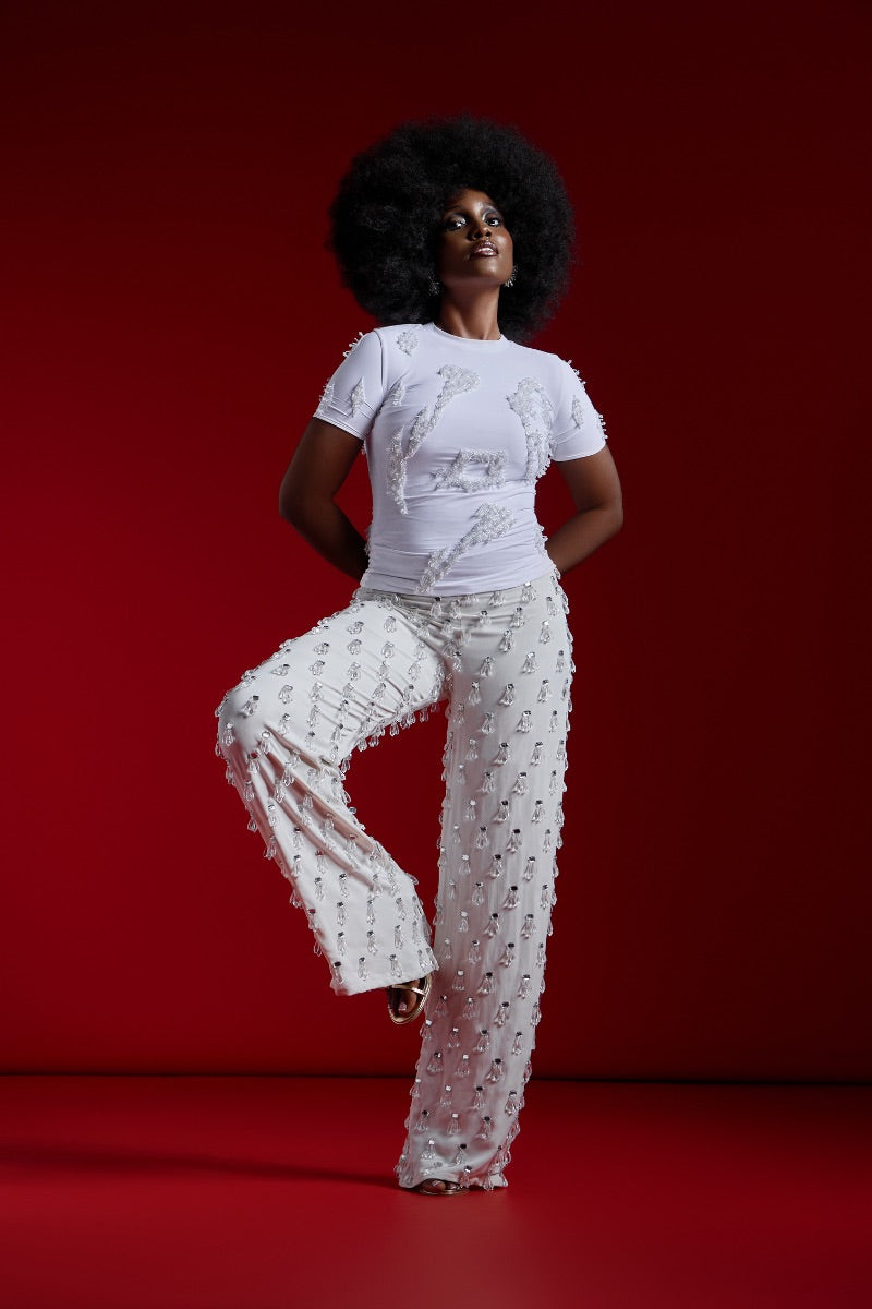 Onalaja TENE beaded white pants with intricate beadwork, stylish and comfortable for casual or dressy occasions.