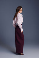 Keira Tong buttons sculpted maxi skirt with a high waist and flowing fabric, shown in a full-length view.