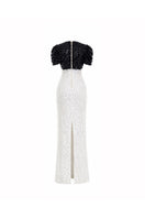 Elegant ivory BIANCA CONTRAST SEQUIN GOWN by HACCHIC COUTURE, featuring shimmering sequins and a flowing gown silhouette.