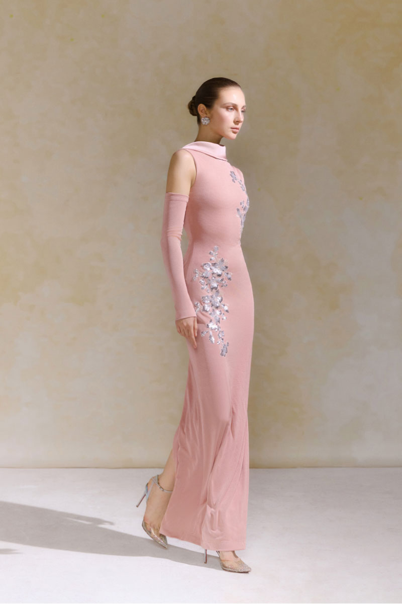 Elegant Arti Apparel Dahlia Midi Dress with floral pattern, sleeveless design, and flowing fabric for a stylish summer look.