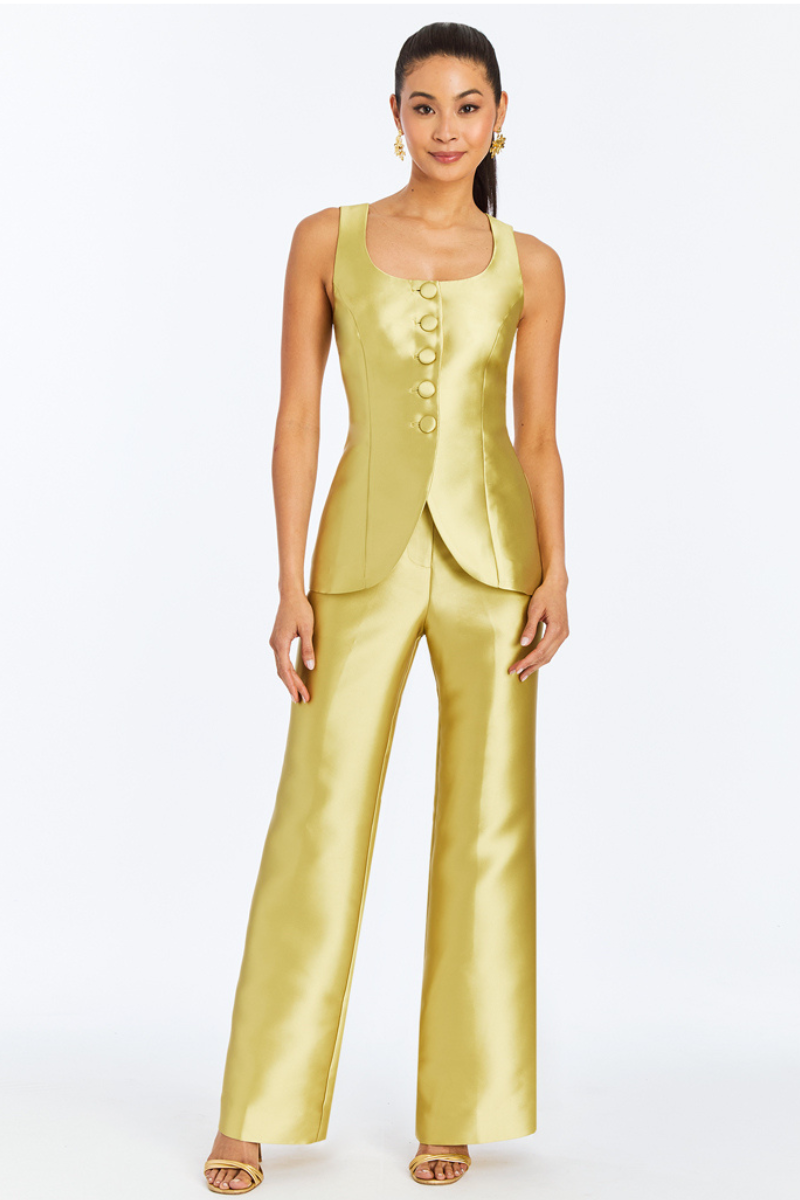 Mestiza New York Taylor pants in golden green fabric with a relaxed fit and tapered leg, displayed on a neutral background.