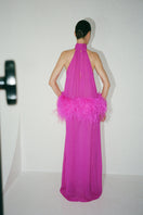 Nué Anaïs gown displayed on a hanger, elegant long dress with flowing fabric perfect for formal occasions