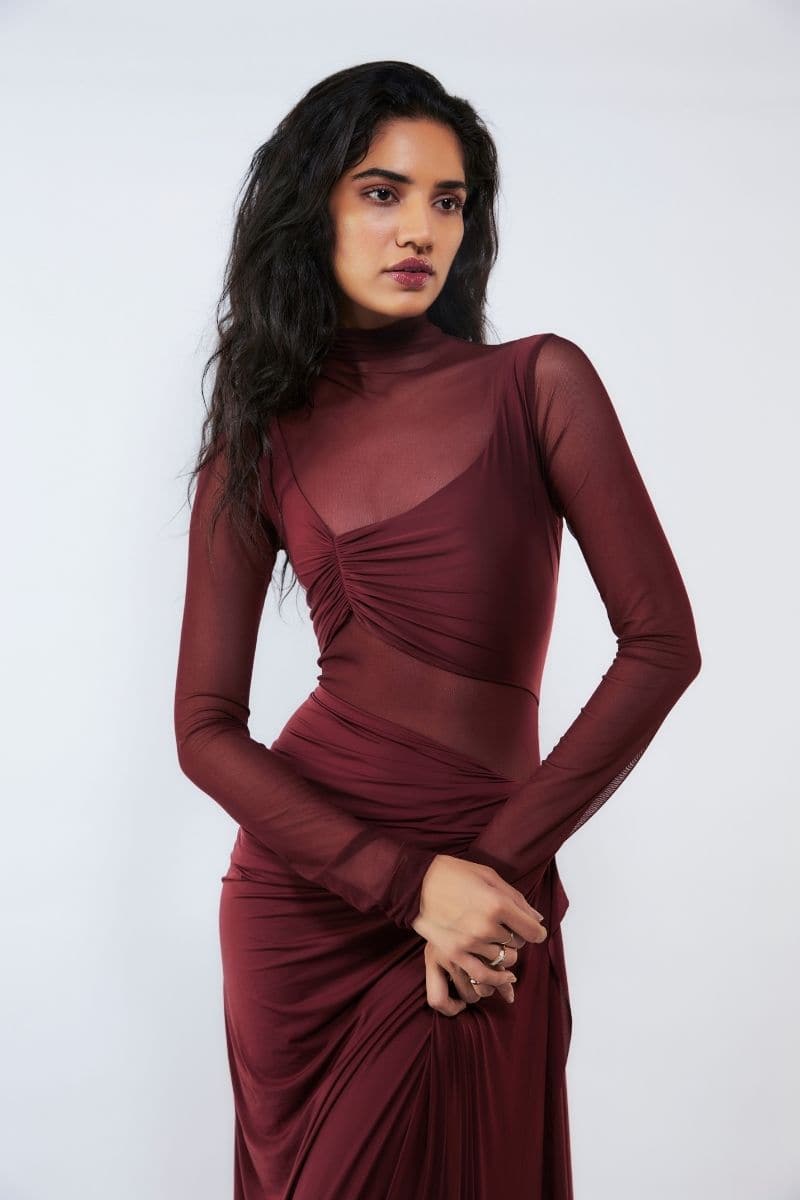 Deme By Gabriella Gloria Cherry Red Ruched Gown featuring a fitted silhouette and elegant draping, perfect for formal occasions.