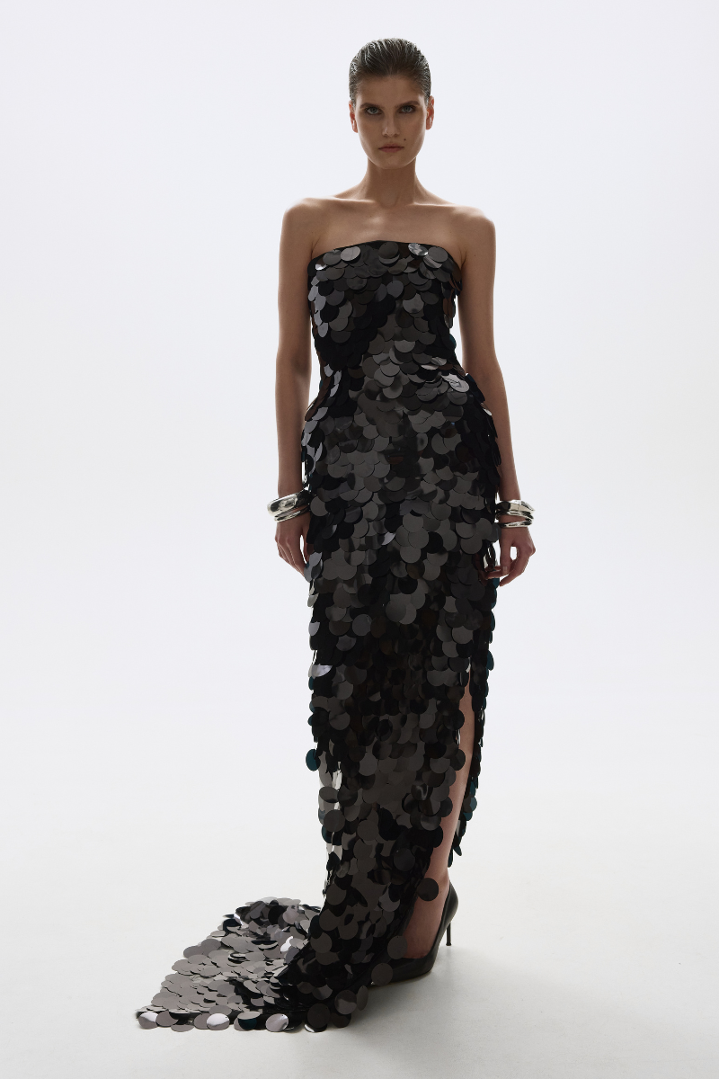 BALYKINA July black gown with elegant design, featuring flowing fabric and classic silhouette for formal occasions.