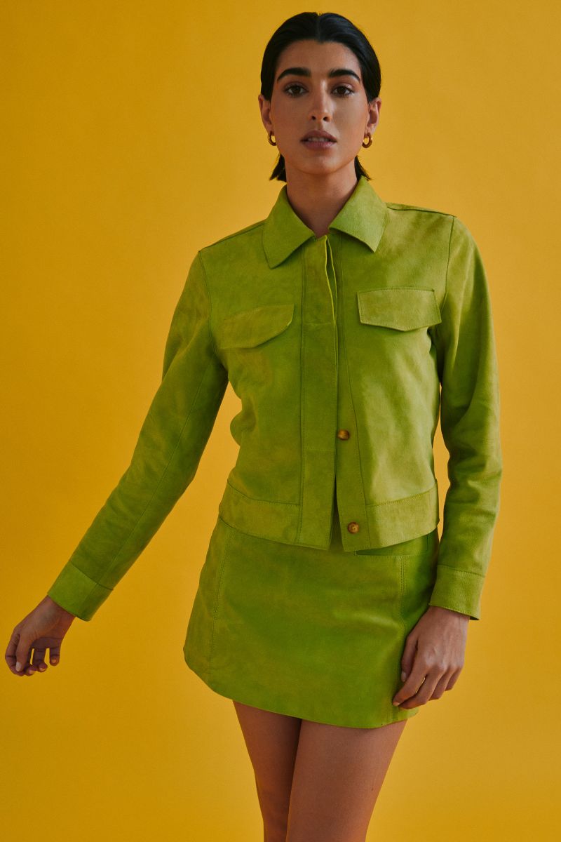 Green mini skirt from ZUT's MINI PARIA collection, featuring a stylish and fitted design perfect for casual or trendy outfits.